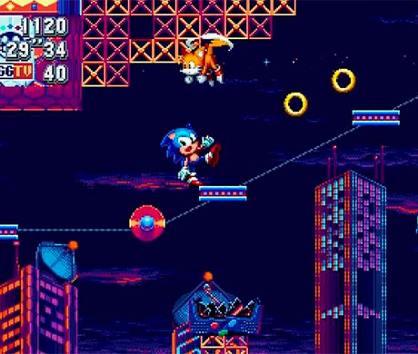 Sonic subiendo por una plataforma mientras Tails vuela en Sonic Mania