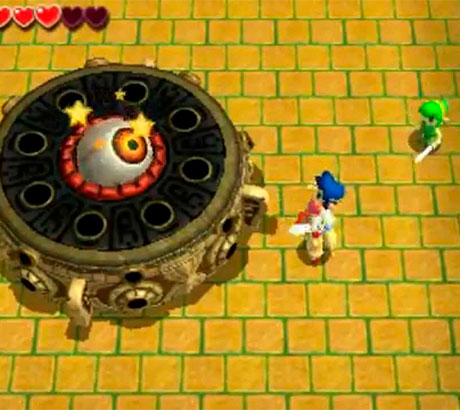 Links luchando contra boss de mazmorra en The Legend of Zelda: Tri Force Heroes