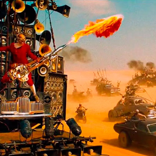 Imagen del usuario de la guitarra lanzallamas tocando en la película mad max: fury road.