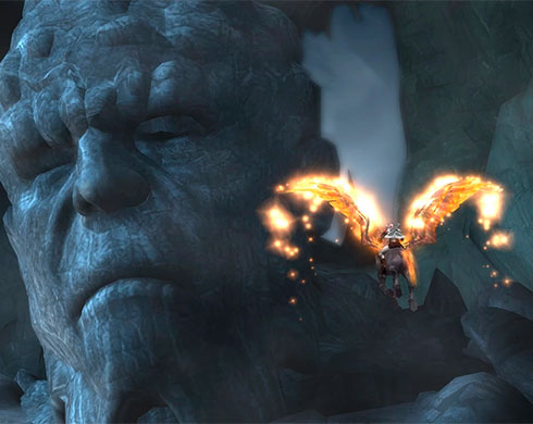 Imagen de Kratos montado en Pegaso volando hacia la cara de Tifón en el juego God of War II.