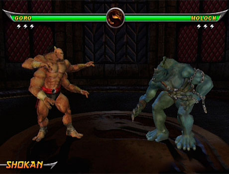 Imagen de Goro enfrentándose a Moloch en el juego Mortal Kombat: Armageddon.