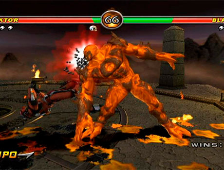 Imagen de Sektor enfrentándose a Blaze en el juego Mortal Kombat: Armageddon.
