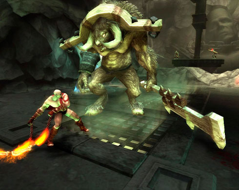 Imagen de Kratos enfrentándose a un minotauro en el juego God of War: Chains of Olympus.